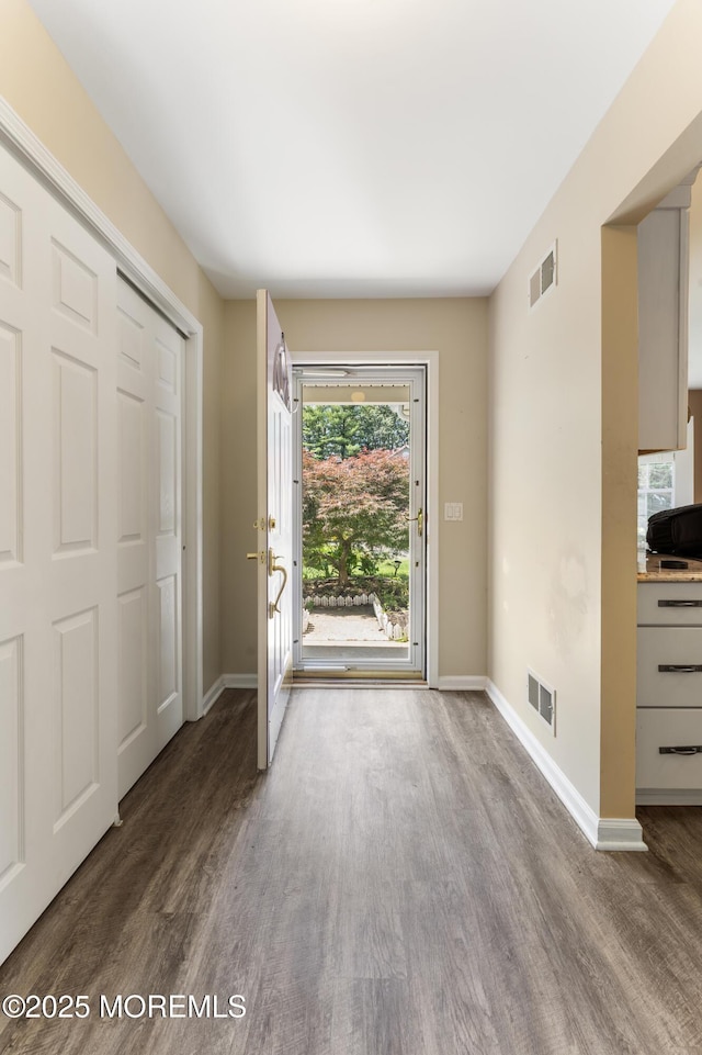 31 Strawberry Ln, Lakewood, NJ 08701 - entryway featuring wood finished floors and baseboards