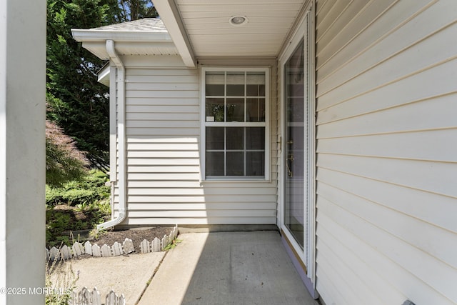 31 Strawberry Ln, Lakewood, NJ 08701 - doorway to property featuring roof with shingles