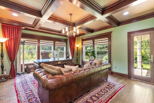 9 Withers Ln, Atlantic Highlands, NJ 07716 - living room featuring a chandelier, healthy amount of natural light, crown molding, beamed ceiling, and coffered ceiling