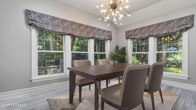 9 Withers Ln, Atlantic Highlands, NJ 07716 - dining room featuring a chandelier, healthy amount of natural light, wood finished floors, and lofted ceiling