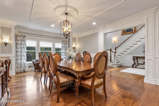 9 Withers Ln, Atlantic Highlands, NJ 07716 - dining space featuring a decorative wall, stairway, a chandelier, wood finished floors, and ornamental molding