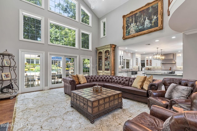 9 Withers Ln, Atlantic Highlands, NJ 07716 - living area with high vaulted ceiling, a chandelier, light wood-style flooring, plenty of natural light, and recessed lighting