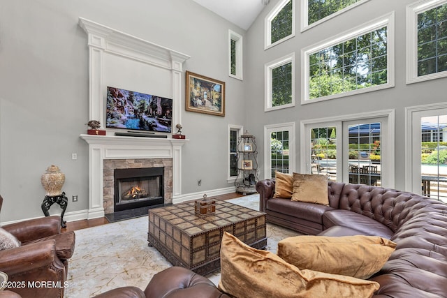 9 Withers Ln, Atlantic Highlands, NJ 07716 - living room with high vaulted ceiling, a fireplace, and wood finished floors