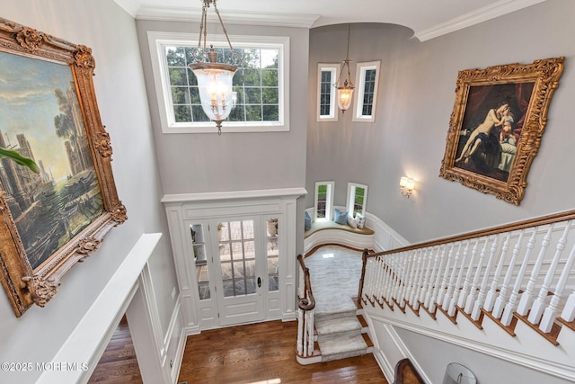 9 Withers Ln, Atlantic Highlands, NJ 07716 - foyer entrance featuring a chandelier, dark wood-style flooring, stairs, and ornamental molding