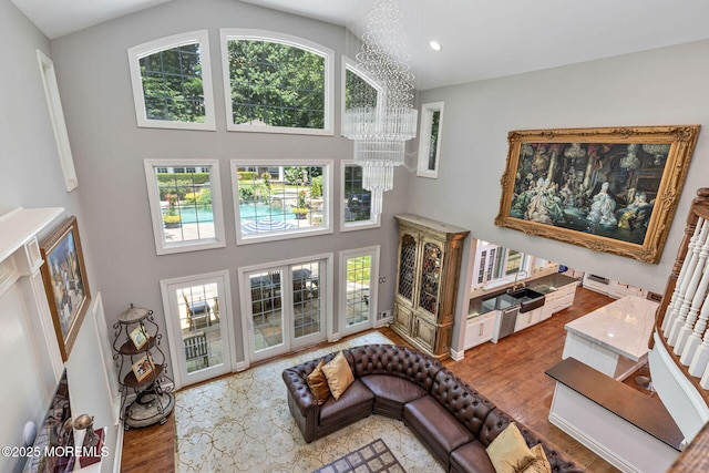 9 Withers Ln, Atlantic Highlands, NJ 07716 - living area with high vaulted ceiling, wood finished floors, a chandelier, and recessed lighting