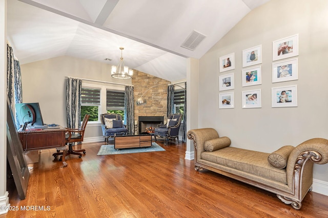 9 Withers Ln, Atlantic Highlands, NJ 07716 - living room featuring lofted ceiling, a chandelier, wood finished floors, a fireplace, and an office area