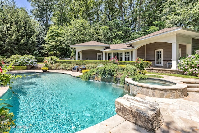 9 Withers Ln, Atlantic Highlands, NJ 07716 - view of swimming pool with a pool with connected hot tub and a patio area