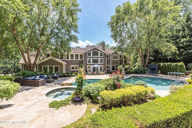9 Withers Ln, Atlantic Highlands, NJ 07716 - outdoor pool featuring an in-ground hot tub, a patio, and an outdoor living space