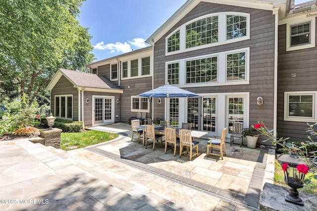 9 Withers Ln, Atlantic Highlands, NJ 07716 - back of house featuring a patio and outdoor dining area