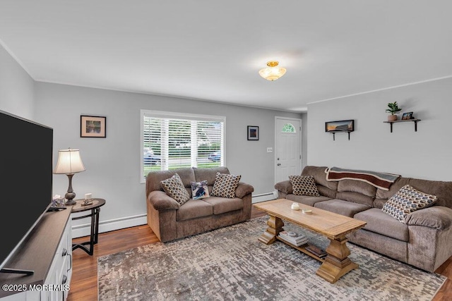 99 Roosevelt Cir E, Red Bank, NJ 07701 - living area featuring a baseboard heating unit and wood finished floors