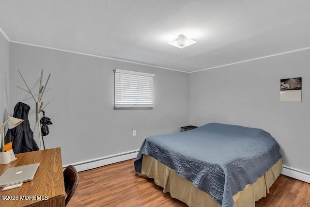 99 Roosevelt Cir E, Red Bank, NJ 07701 - bedroom with a baseboard radiator, wood finished floors, and crown molding