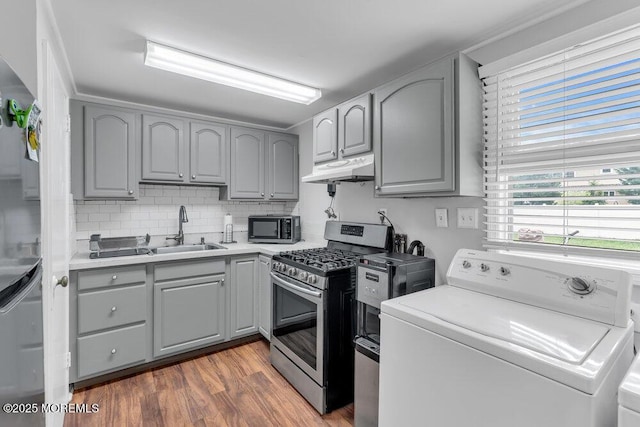 99 Roosevelt Cir E, Red Bank, NJ 07701 - kitchen with gray cabinets and stainless steel range with gas cooktop