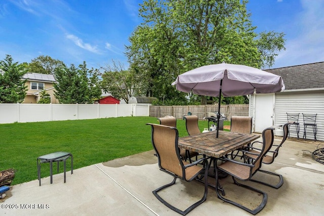 99 Roosevelt Cir E, Red Bank, NJ 07701 - fenced backyard with outdoor dining area and a patio area