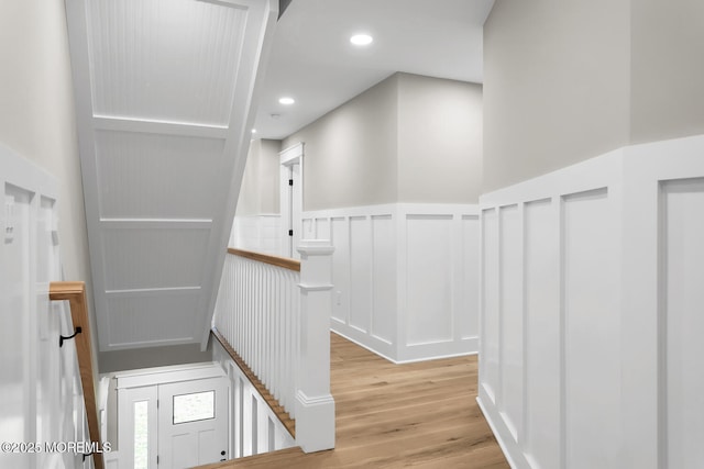 515 Atlantic Ave, Middletown, NJ 07748 - corridor featuring an upstairs landing, light wood-style floors, a decorative wall, recessed lighting, and a wainscoted wall