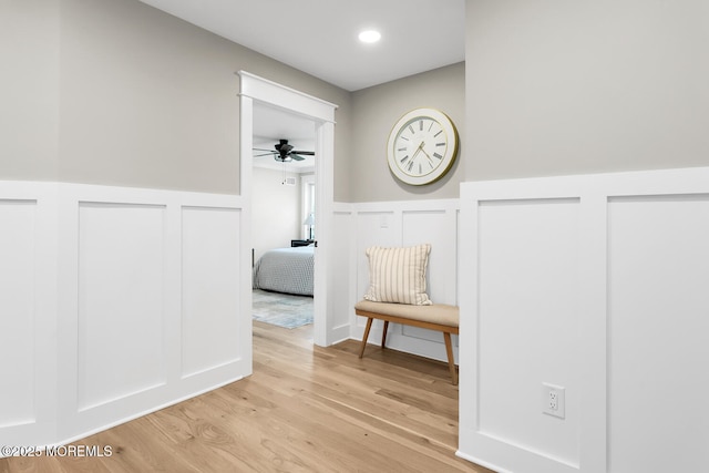 515 Atlantic Ave, Middletown, NJ 07748 - hall with a decorative wall, wainscoting, and light wood-type flooring