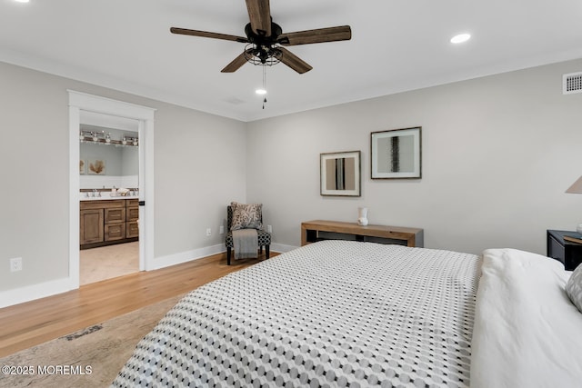 515 Atlantic Ave, Middletown, NJ 07748 - bedroom with light wood finished floors, recessed lighting, connected bathroom, and ceiling fan