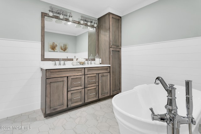 515 Atlantic Ave, Middletown, NJ 07748 - full bathroom with ornamental molding, double vanity, a freestanding bath, wainscoting, and wooden walls