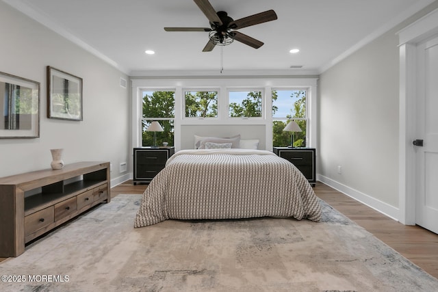 515 Atlantic Ave, Middletown, NJ 07748 - bedroom with ornamental molding, multiple windows, wood finished floors, recessed lighting, and a ceiling fan