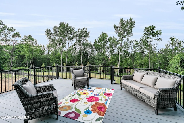 515 Atlantic Ave, Middletown, NJ 07748 - wooden deck featuring outdoor lounge area and view of wooded area