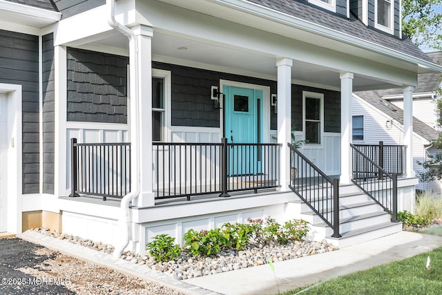 515 Atlantic Ave, Middletown, NJ 07748 - doorway to property featuring a shingled roof and a porch