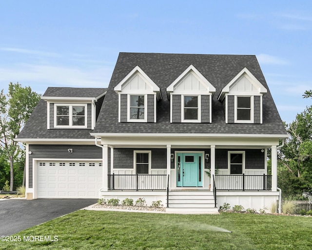 515 Atlantic Ave, Middletown, NJ 07748 - view of front of home featuring driveway, a front lawn, roof with shingles, a porch, and an attached garage