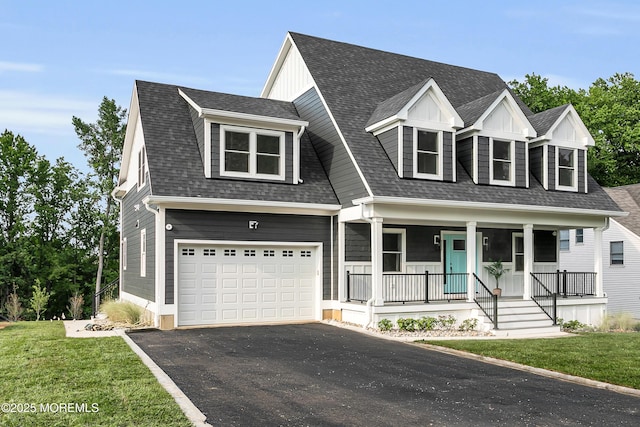 515 Atlantic Ave, Middletown, NJ 07748 - view of front facade featuring driveway, a garage, a porch, and a shingled roof