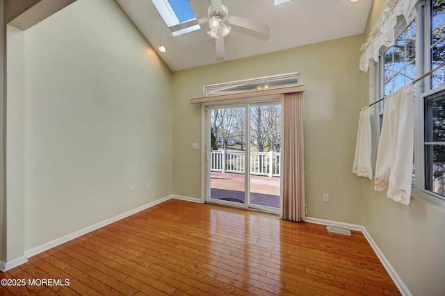 4 Nautic Way, Little Egg Harbor, NJ 08087 - unfurnished room featuring a skylight, plenty of natural light, hardwood / wood-style flooring, vaulted ceiling, and ceiling fan
