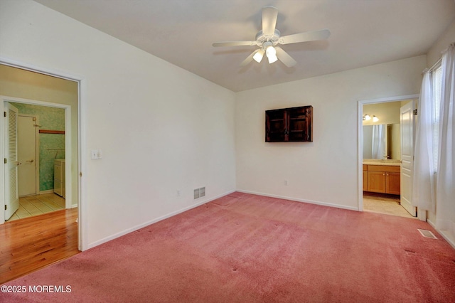 4 Nautic Way, Little Egg Harbor, NJ 08087 - unfurnished bedroom featuring light colored carpet, connected bathroom, and washer / clothes dryer