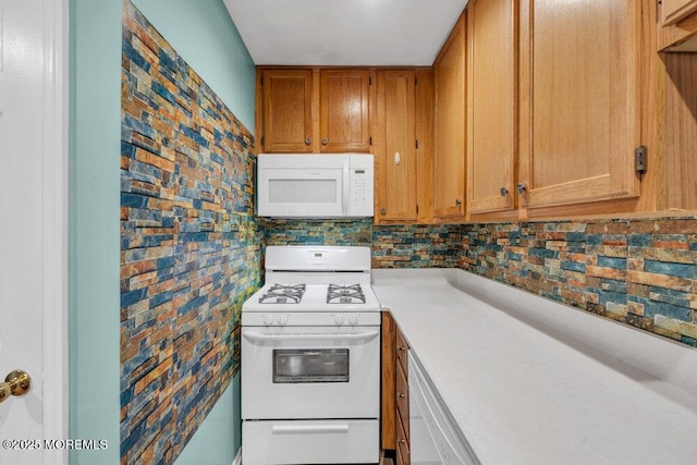 4511 Birchwood Ct, North Brunswick, NJ 08902 - kitchen featuring white appliances, light countertops, backsplash, and brown cabinets