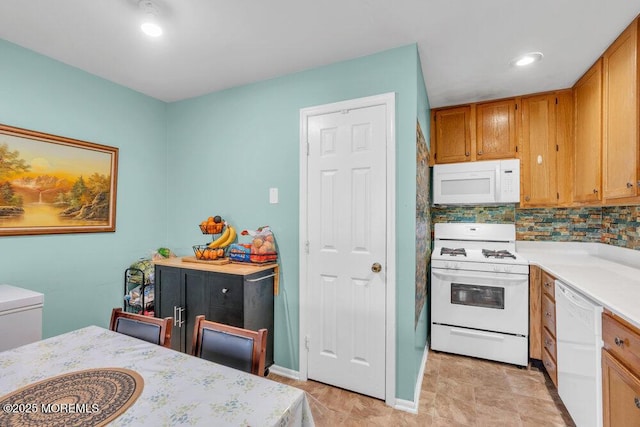 4511 Birchwood Ct, North Brunswick, NJ 08902 - kitchen featuring white appliances, light countertops, brown cabinetry, backsplash, and recessed lighting