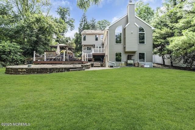 156 Magnolia Ln, Middletown, NJ 07748 - back of property with a chimney and a deck