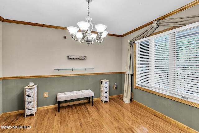 156 Magnolia Ln, Middletown, NJ 07748 - sitting room with crown molding, a chandelier, and wood finished floors