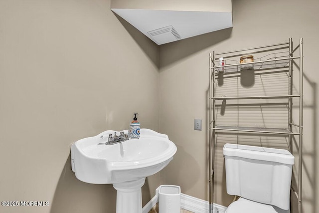 156 Magnolia Ln, Middletown, NJ 07748 - bathroom with toilet and baseboards