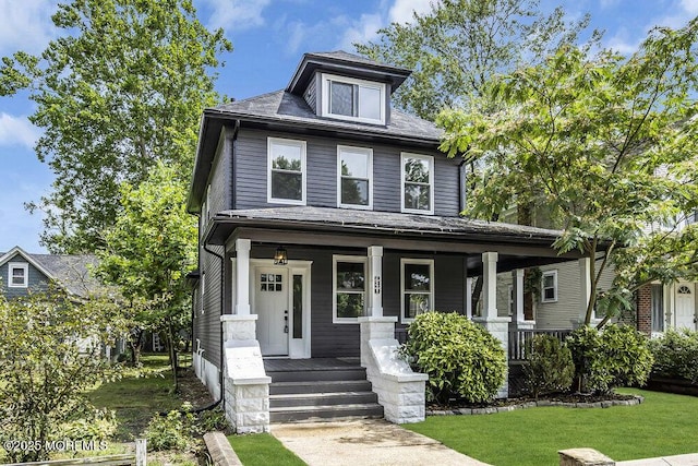 420 Philadelphia Ave, Egg Harbor City, NJ 08215 - american foursquare style home with a porch and a front lawn