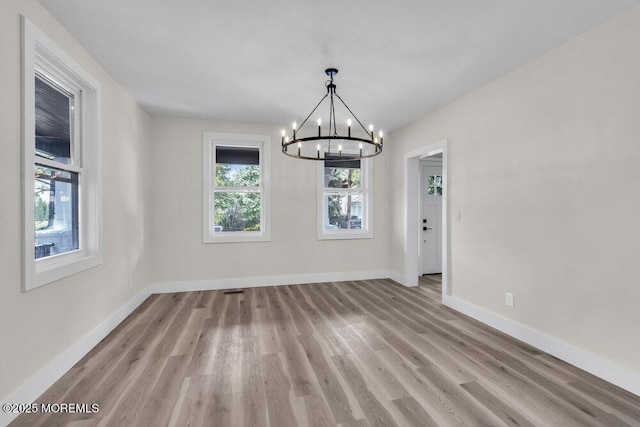 420 Philadelphia Ave, Egg Harbor City, NJ 08215 - unfurnished dining area featuring a chandelier and light wood-style floors