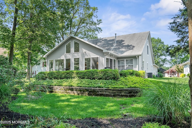 1714 Buttonwood Ave, Toms River, NJ 08755 - view of front facade with roof with shingles and a front yard