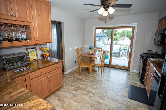 36 Cori St, Parlin, NJ 08859 - kitchen featuring black appliances, ceiling fan, dark stone counters, and light stone finish flooring