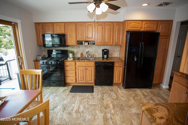 36 Cori St, Parlin, NJ 08859 - kitchen with black appliances, a ceiling fan, backsplash, stone countertops, and brown cabinets