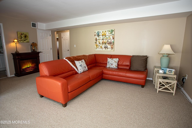 36 Cori St, Parlin, NJ 08859 - living area with carpet and a lit fireplace
