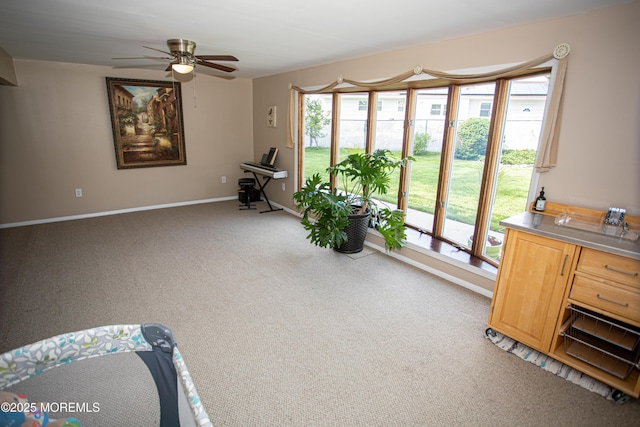 36 Cori St, Parlin, NJ 08859 - living area featuring healthy amount of natural light, a ceiling fan, and carpet floors