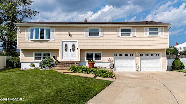 36 Cori St, Parlin, NJ 08859 - split foyer home featuring a garage and concrete driveway