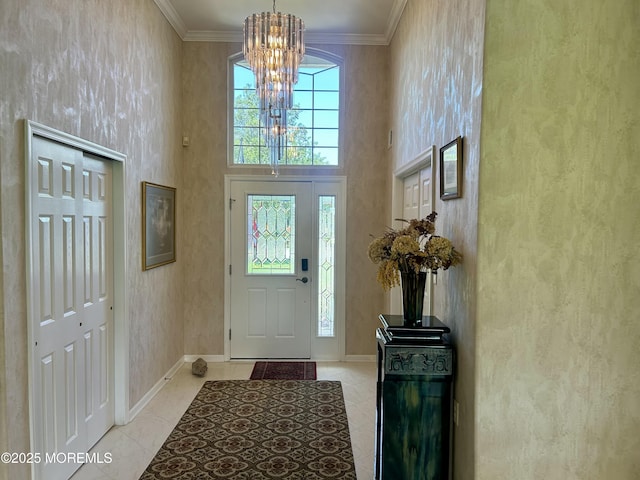 7 Fontaine Ct, Manchester, NJ 08759 - entryway with a chandelier, healthy amount of natural light, a high ceiling, and crown molding