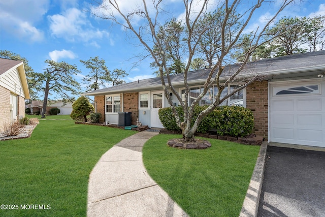 66B Buckingham Dr, Manchester, NJ 08759 - single story home with brick siding and a front yard