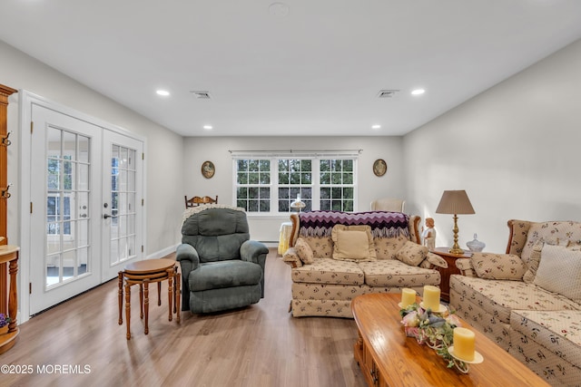 66B Buckingham Dr, Manchester, NJ 08759 - living area featuring light wood-style floors, recessed lighting, and french doors