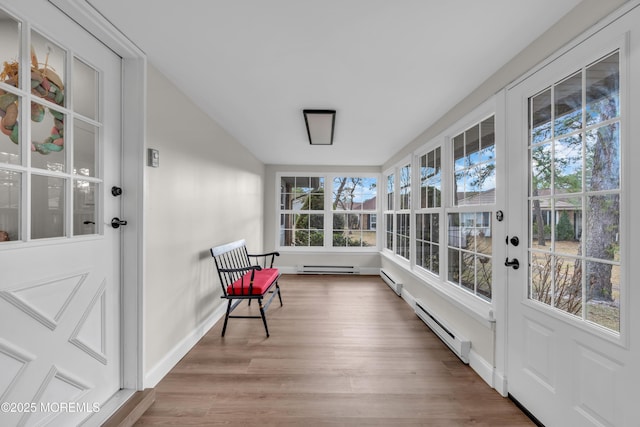 66B Buckingham Dr, Manchester, NJ 08759 - unfurnished sunroom with french doors, baseboard heating, and wood finished floors