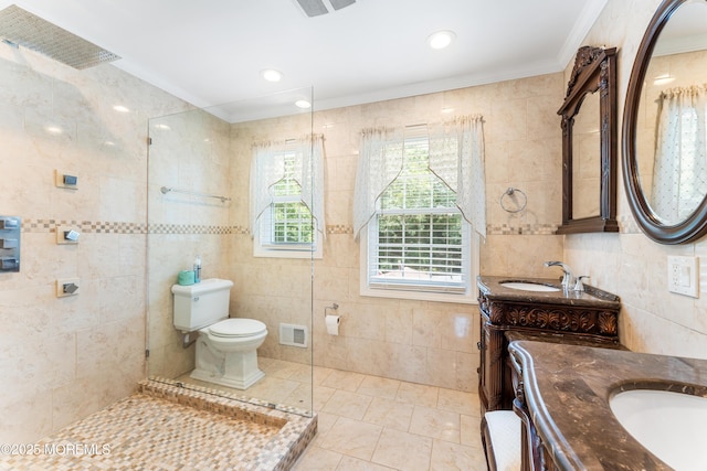 26 N Boston Rd, Jackson, NJ 08527 - bathroom with tile walls, crown molding, vanity, tile patterned floors, and a tile shower