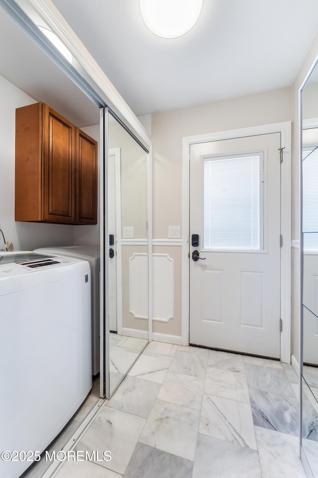 26 N Boston Rd, Jackson, NJ 08527 - laundry area featuring cabinet space, washer / dryer, and light marble finish floors