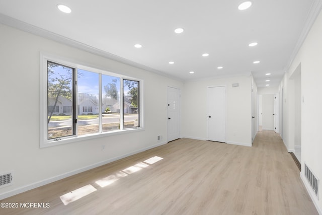 74 Brand Rd, Toms River, NJ 08753 - unfurnished living room with light wood finished floors, recessed lighting, and crown molding