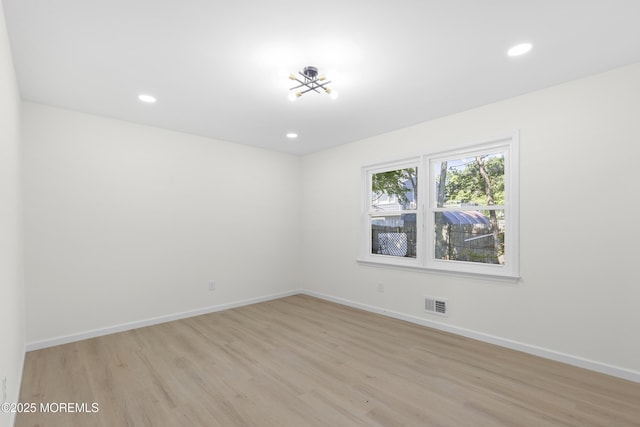 74 Brand Rd, Toms River, NJ 08753 - empty room with light wood-style flooring and recessed lighting