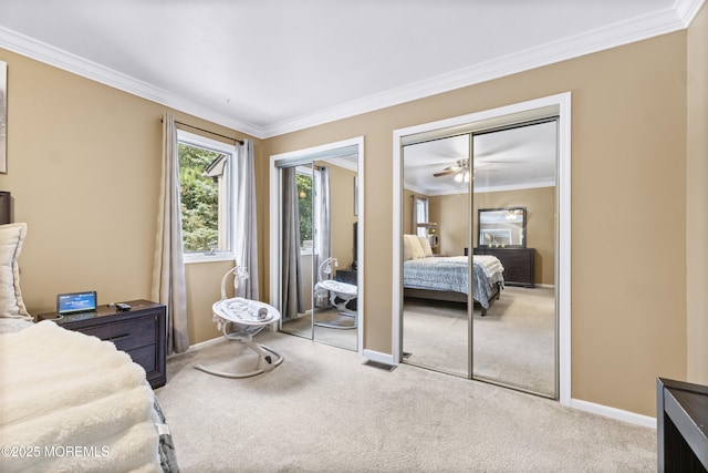 48 Carmel Ct, Old Bridge, NJ 08857 - carpeted bedroom featuring multiple closets and ornamental molding